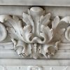 ( Réservée)Belle cheminée ancienne de style Louis XVI a décors de postes ,rosaces et acanthes réalisée en marbre Blanc de Carrare datant de la fin du XIXème siècle