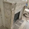 ( Réservée) Jolie cheminée ancienne de style Louis XVI en marbre Arabescato datant de la fin du XIXème siècle