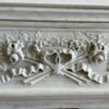 Belle et fine cheminée ancienne de style Louis XVI réalisée en marbre de carrare blanc datant de la fin du XIXème siècle bandeau sculpté d’un Rameau d’olivier et de roses .